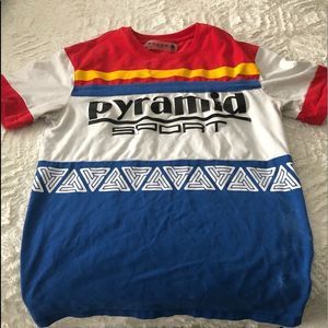 Small, short sleeve Red & White Black Pyramid Tee. Chris Brown apparel.